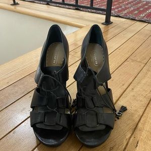 Coach platform tie heels